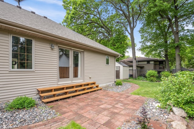11228 River Rd, Champlin, MN 55316 - view of patio with a shed