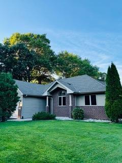 11228 River Rd, Champlin, MN 55316 - view of front facade with a front lawn