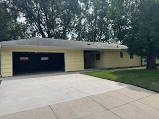 11721 Olive St NW, Coon Rapids, MN 55448 - single story home with a garage, concrete driveway, and a front yard