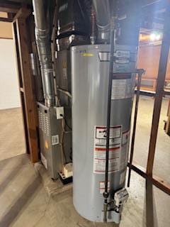 11721 Olive St NW, Coon Rapids, MN 55448 - utility room with water heater