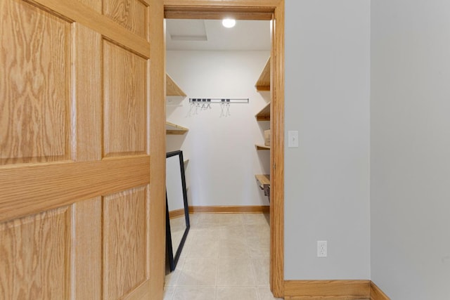 215 Plainview St, Owatonna, MN 55060 - walk in closet featuring light tile patterned floors
