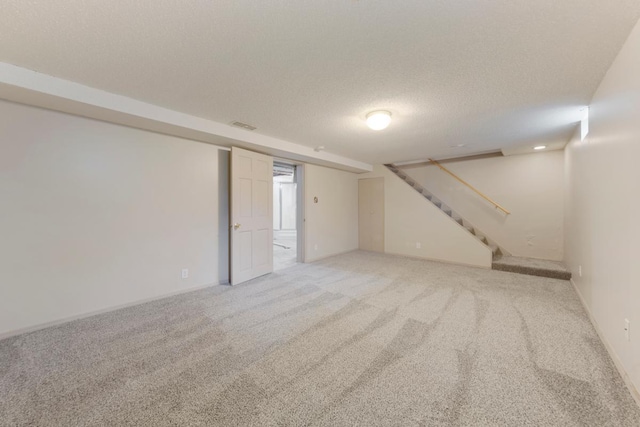 215 Plainview St, Owatonna, MN 55060 - finished basement featuring light carpet and stairs