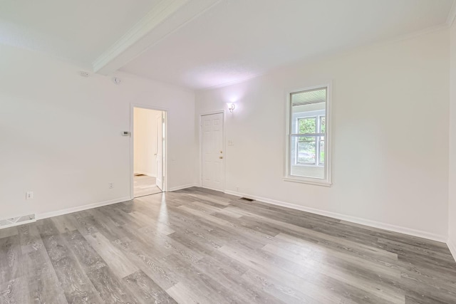 1826 Case Ave E, Saint Paul, MN 55119 - unfurnished room with wood finished floors, beamed ceiling, and ornamental molding