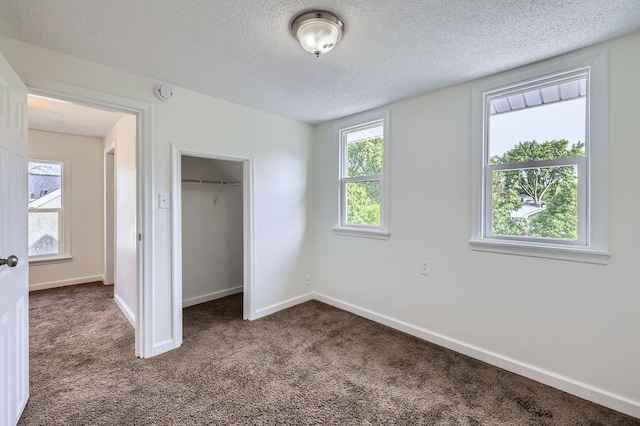 1826 Case Ave E, Saint Paul, MN 55119 - unfurnished bedroom with carpet floors and a textured ceiling