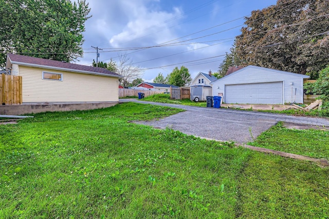 1826 Case Ave E, Saint Paul, MN 55119 - view of yard with an outdoor structure and a garage