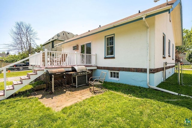 1718 Dunedin Ave, Duluth, MN 55803 - back of house featuring a wooden deck, stairs, and stucco siding
