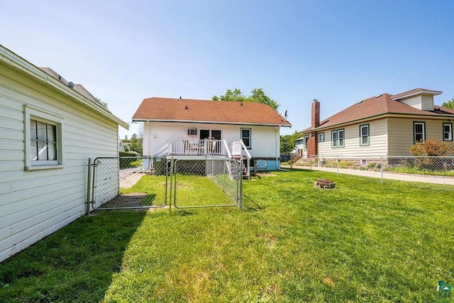 1718 Dunedin Ave, Duluth, MN 55803 - rear view of house with a gate and a fenced backyard