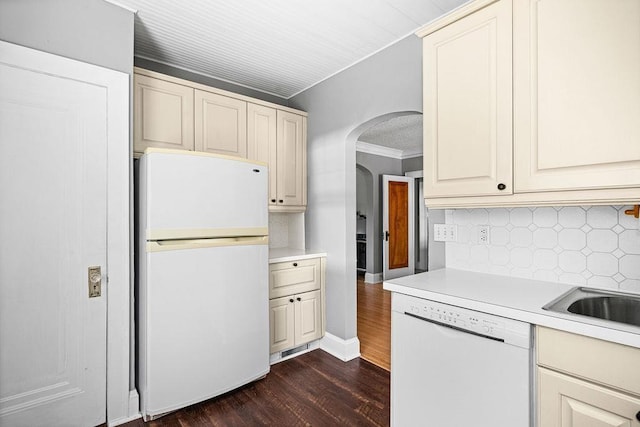 1718 Dunedin Ave, Duluth, MN 55803 - kitchen featuring white appliances, arched walkways, ornamental molding, dark wood-style flooring, and cream cabinetry