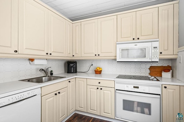 1718 Dunedin Ave, Duluth, MN 55803 - kitchen featuring white appliances, light countertops, and backsplash