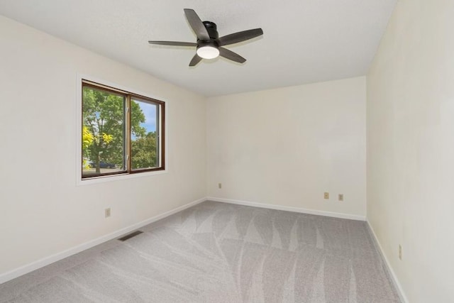8983 Vinewood Ln N, Maple Grove, MN 55369 - carpeted empty room featuring a ceiling fan and baseboards