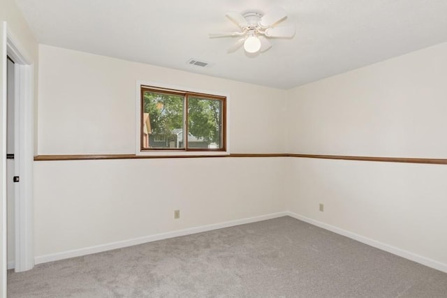 8983 Vinewood Ln N, Maple Grove, MN 55369 - empty room with light carpet and ceiling fan