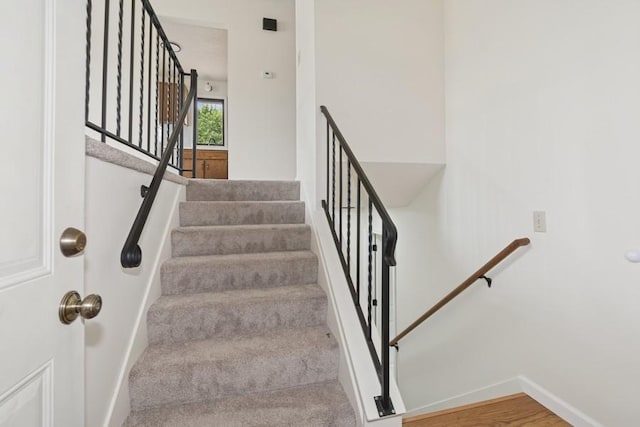 8983 Vinewood Ln N, Maple Grove, MN 55369 - stairs featuring baseboards and wood finished floors