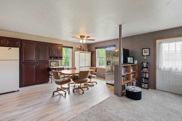 18400 Lundgren Dr, Pine Lake Twp, MN 55735 - dining room featuring a ceiling fan and light wood-type flooring