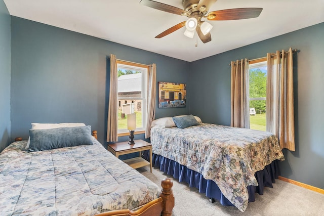 18400 Lundgren Dr, Pine Lake Twp, MN 55735 - carpeted bedroom featuring baseboards and ceiling fan