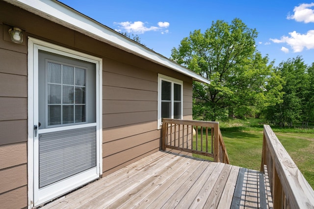 18400 Lundgren Dr, Pine Lake Twp, MN 55735 - wooden deck with a yard