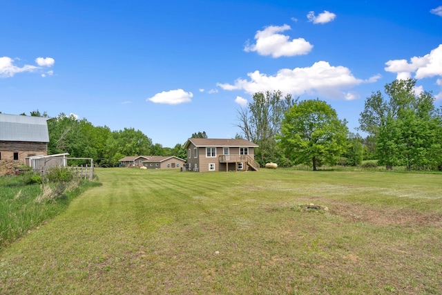 18400 Lundgren Dr, Pine Lake Twp, MN 55735 - view of grassy yard featuring stairs and a deck