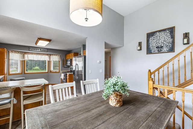 5830 Forest Boulevard Trl, Wyoming, MN 55092 - dining room with stairway
