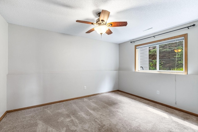 5830 Forest Boulevard Trl, Wyoming, MN 55092 - carpeted empty room featuring a textured ceiling and a ceiling fan
