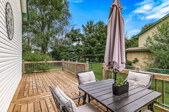 5830 Forest Boulevard Trl, Wyoming, MN 55092 - deck with outdoor dining space and a yard