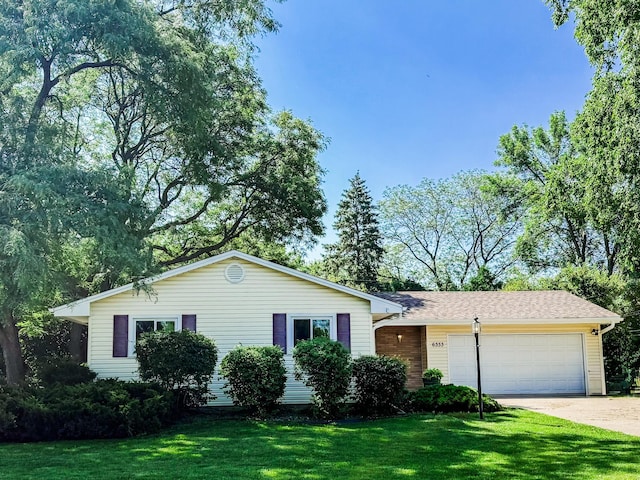 6333 Birchwood Rd, Woodbury, MN 55125 - ranch-style home featuring driveway, a garage, and a front yard