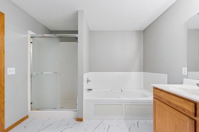 886 Coon Rapids Boulevard Extension NW, Coon Rapids, MN 55433 - bathroom with marble finish flooring, vanity, a garden tub, a shower stall, and a textured ceiling