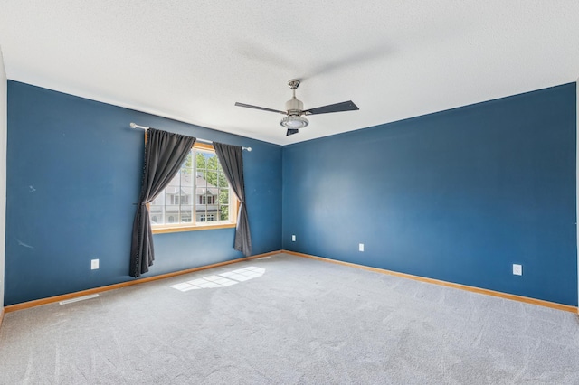 886 Coon Rapids Boulevard Extension NW, Coon Rapids, MN 55433 - empty room featuring ceiling fan, carpet flooring, and a textured ceiling