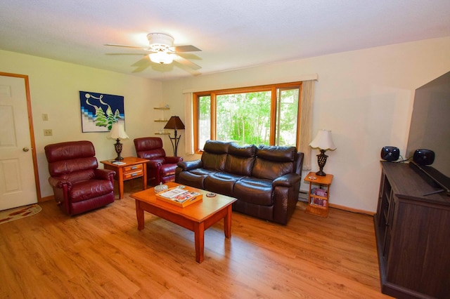 31879 US-71, Park Rapids, MN 56470 - living area featuring light wood finished floors, ceiling fan, and a baseboard heating unit