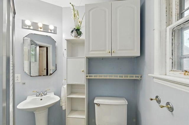 697 Tuscarora Ave, Saint Paul, MN 55102 - bathroom featuring toilet and a sink