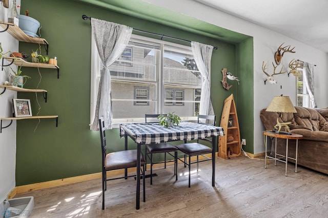 1035 University Dr N, Fargo, ND 58102 - dining area featuring wood finished floors and baseboards