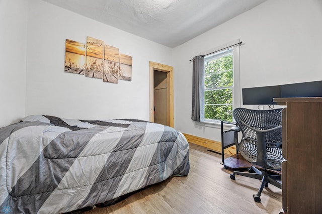1035 University Dr N, Fargo, ND 58102 - bedroom with wood finished floors and baseboards
