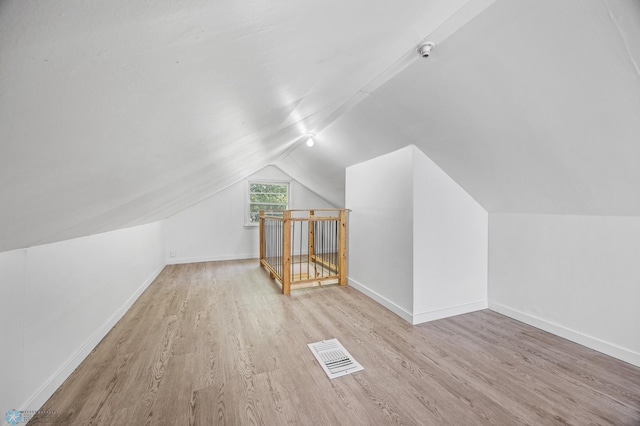 1035 University Dr N, Fargo, ND 58102 - bonus room with wood finished floors and vaulted ceiling