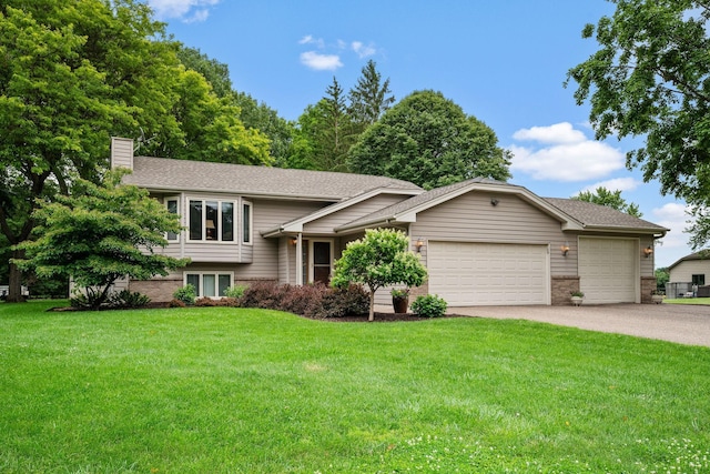 2520 Florida Ave N, Golden Valley, MN 55427 - tri-level home featuring driveway, an attached garage, brick siding, and a chimney