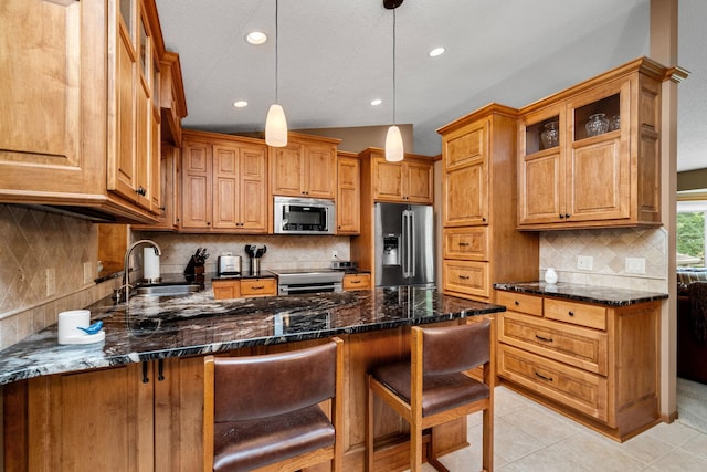 2520 Florida Ave N, Golden Valley, MN 55427 - kitchen with stainless steel appliances, a peninsula, recessed lighting, tasteful backsplash, and hanging light fixtures