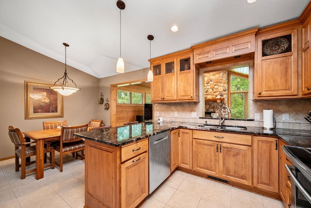 2520 Florida Ave N, Golden Valley, MN 55427 - kitchen with dishwasher, lofted ceiling, backsplash, a peninsula, and pendant lighting