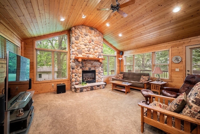 2520 Florida Ave N, Golden Valley, MN 55427 - living area featuring vaulted ceiling, wood ceiling, carpet floors, recessed lighting, and a stone fireplace
