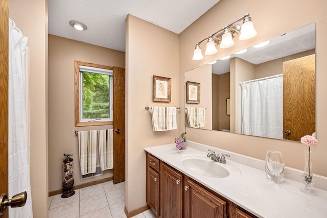 2520 Florida Ave N, Golden Valley, MN 55427 - bathroom with vanity, tile patterned floors, and a shower with shower curtain