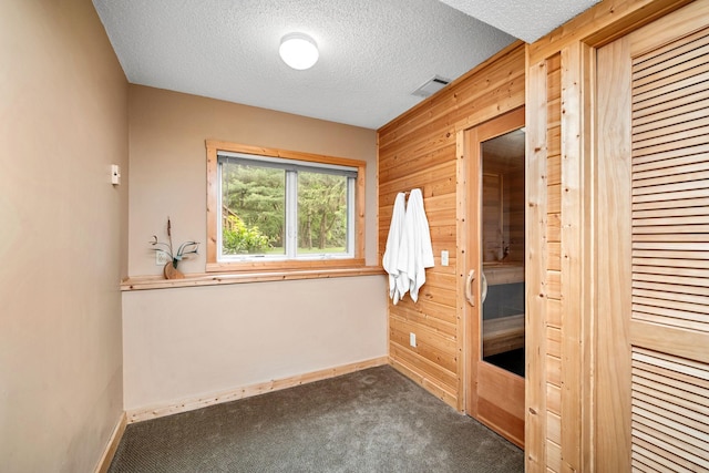 2520 Florida Ave N, Golden Valley, MN 55427 - bathroom with wood walls and a textured ceiling