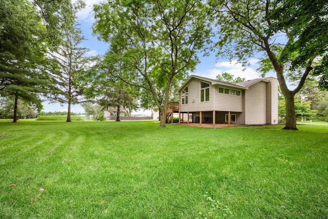2520 Florida Ave N, Golden Valley, MN 55427 - view of green lawn with a deck and stairway