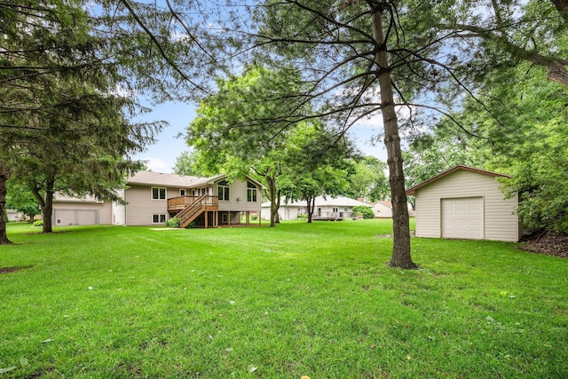 2520 Florida Ave N, Golden Valley, MN 55427 - view of grassy yard featuring stairs, a wooden deck, and an outbuilding