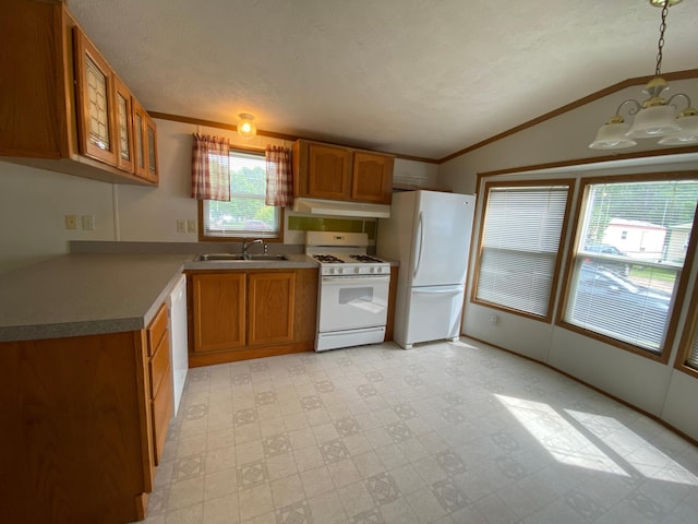 225 Jay St Unit 12, Sandstone, MN 55072 - kitchen featuring white appliances, a chandelier, brown cabinetry, lofted ceiling, and under cabinet range hood