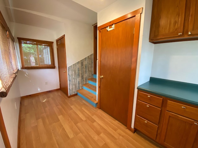 225 Jay St Unit 12, Sandstone, MN 55072 - staircase with wood finished floors and baseboards