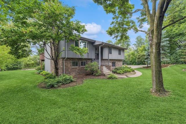 551 Townes Rd, Minnetonka, MN 55391 - raised ranch with a front yard and brick siding