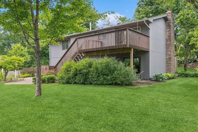 551 Townes Rd, Minnetonka, MN 55391 - rear view of house with a deck, a yard, a chimney, and stairs