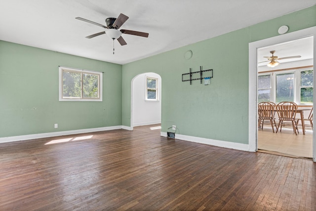 1273 County Rd N, Kinnickinnic Twp, WI 54023 - unfurnished room with ceiling fan, hardwood / wood-style floors, and arched walkways