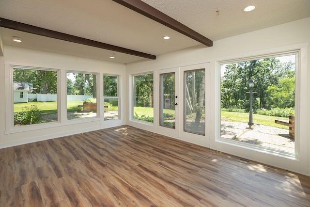 405 River St SW, Chatfield, MN 55923 - unfurnished sunroom featuring beamed ceiling, wood finished floors, french doors, recessed lighting, and a deck