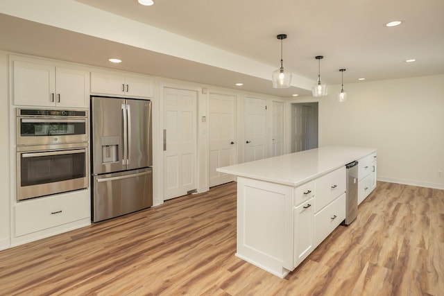 405 River St SW, Chatfield, MN 55923 - kitchen featuring appliances with stainless steel finishes, recessed lighting, white cabinets, and light wood-type flooring