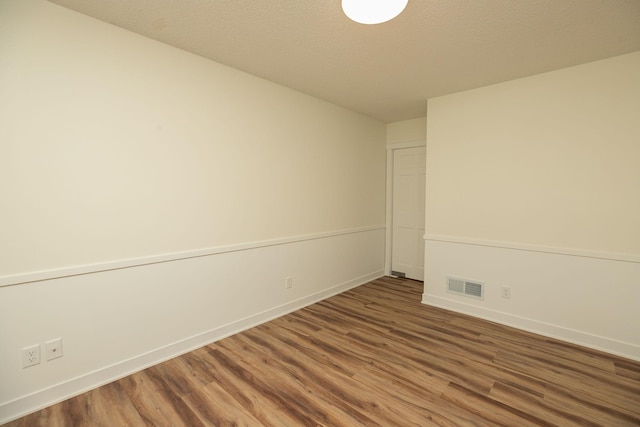405 River St SW, Chatfield, MN 55923 - empty room with wood finished floors and baseboards