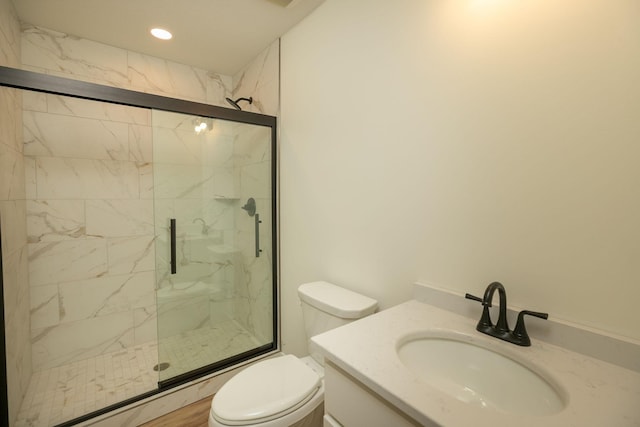405 River St SW, Chatfield, MN 55923 - bathroom featuring a marble finish shower, vanity, and recessed lighting