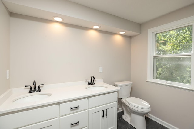 405 River St SW, Chatfield, MN 55923 - bathroom with tile patterned flooring, double vanity, and recessed lighting