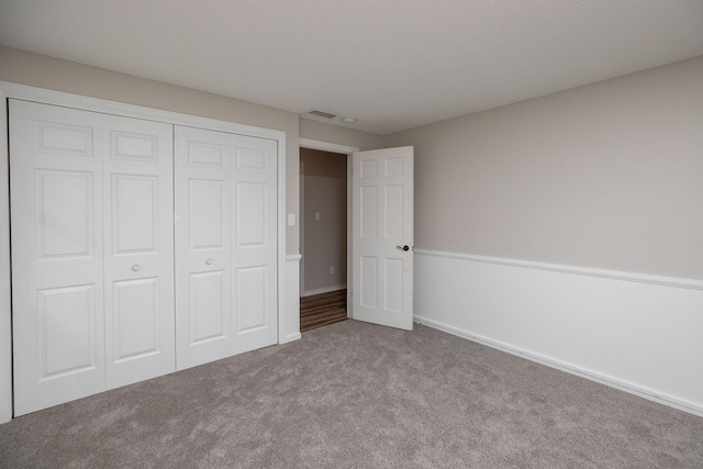 405 River St SW, Chatfield, MN 55923 - unfurnished bedroom with carpet floors and a closet